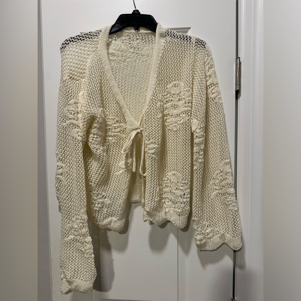 Cream front tie cardigan.